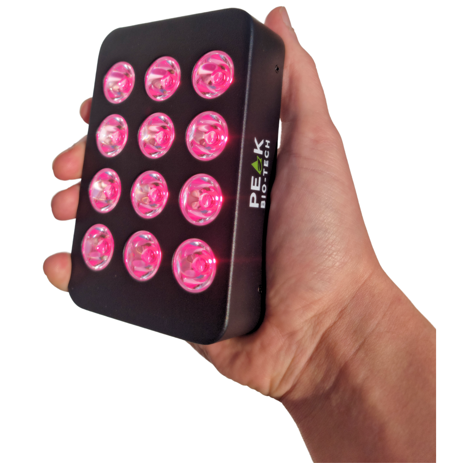 Peak Bio-Tech Peak Mini 60W portable clinical-grade red light therapy panel held in hand, showcasing its compact size and operating LEDs
